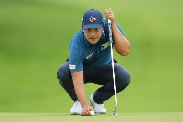 Travelers Championship - Round Three K.H. Lee of Korea lines up a putt on the fourth green during the third round of the Travelers Championship at TPC River Highlands on Saturday in Cromwell, Connecticut. (Photo by Drew Hallowell/Getty Images)