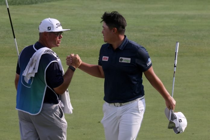 Sungjae Im of South Korea reacts on the 18th green after finishing the third round of the BMW Championship at Caves Valley Golf Club in Owings Mills, Maryland. (Photo by Rob Carr/Getty Images)