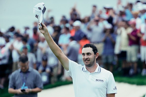 Patrick Cantlay celebrates after defeating Bryson DeChambeau on the sixth playoff hole during the final round of the BMW Championship at Caves Valley Golf Club in Owings Mills, Maryland. (Photo by Tim Nwachukwu/Getty Images)