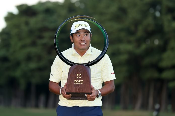 Hideki Matsuyama of Japan poses with the trophy after winning the ZOZO Championship at Accordia Golf Narashino Country Club on Sunday. (Photo by Atsushi Tomura/Getty Images)