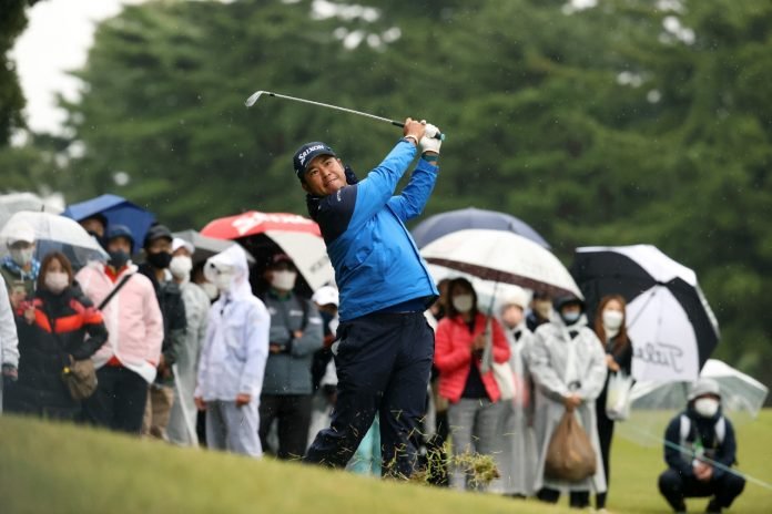 Hideki Matsuyama of Japan hits his second shot on the 12th hole during the second round of the ZOZO Championship at Accordia Golf Narashino Country Club on Friday. (Photo by Atsushi Tomura/Getty Images)