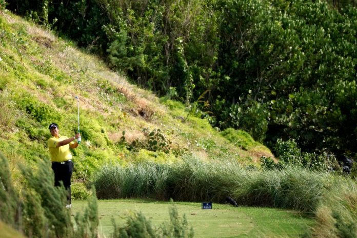 Kiradech Kiradech Aphibarnrat tees off on the 16th hole during round one of the Butterfield Bermuda Championship at Port Royal Golf Course. (Photo by Cliff Hawkins/Getty Images)